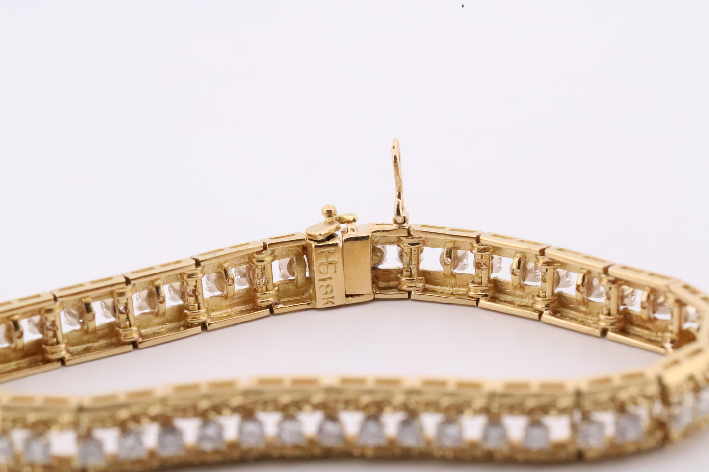 Intricately Designed 18K Vintage Diamond Tennis Bracelet by Hammerman Brothers