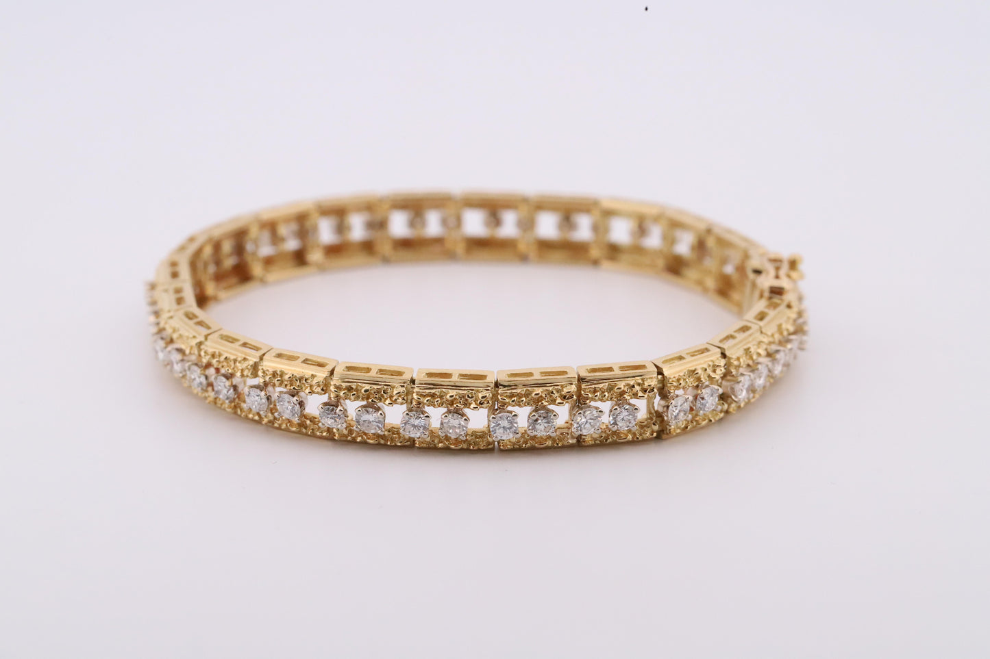 Intricately Designed 18K Vintage Diamond Tennis Bracelet by Hammerman Brothers