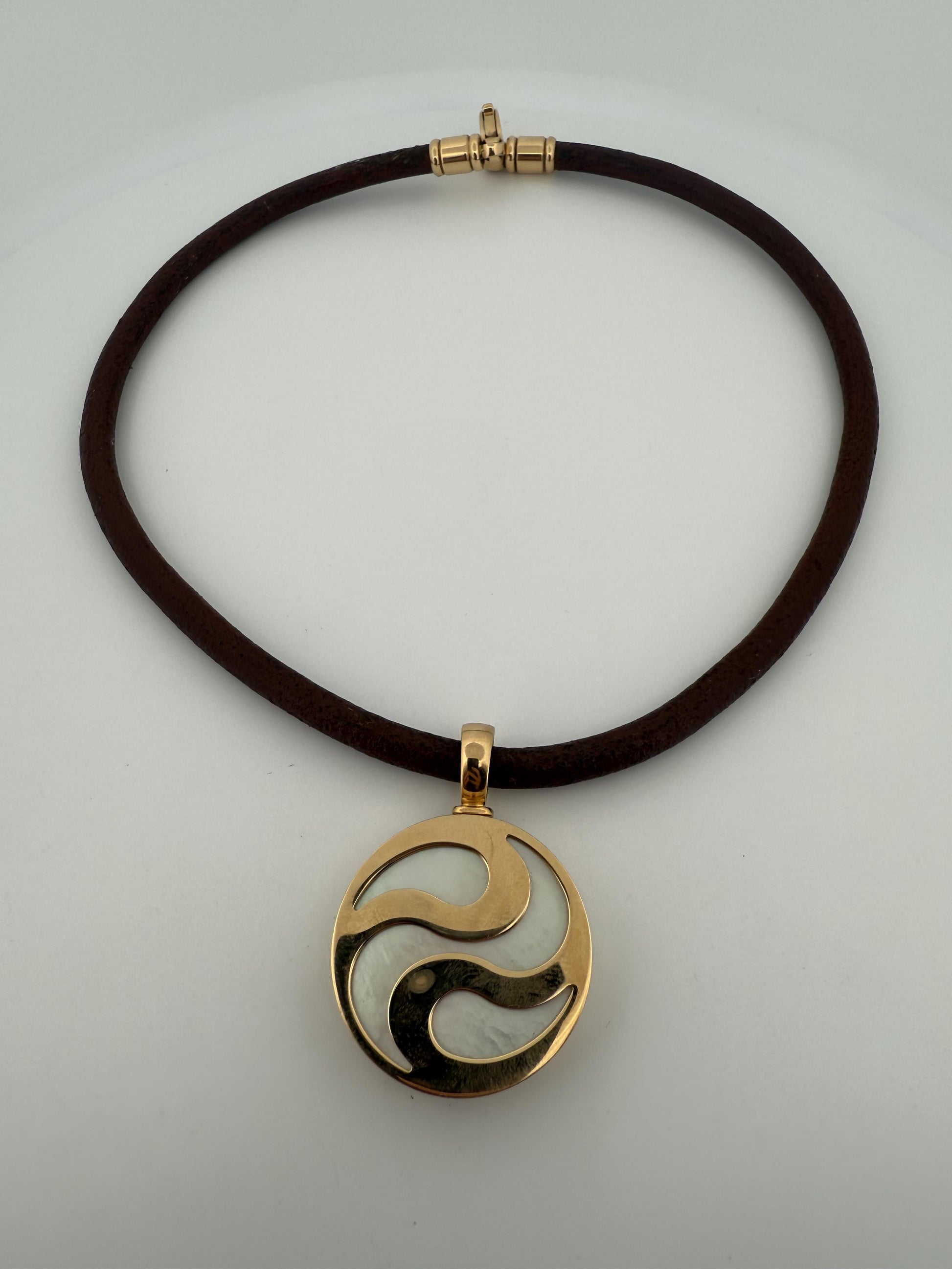 Bulgari Spinning MOP Optical Illusion Pendant w/18K and Leather Necklace