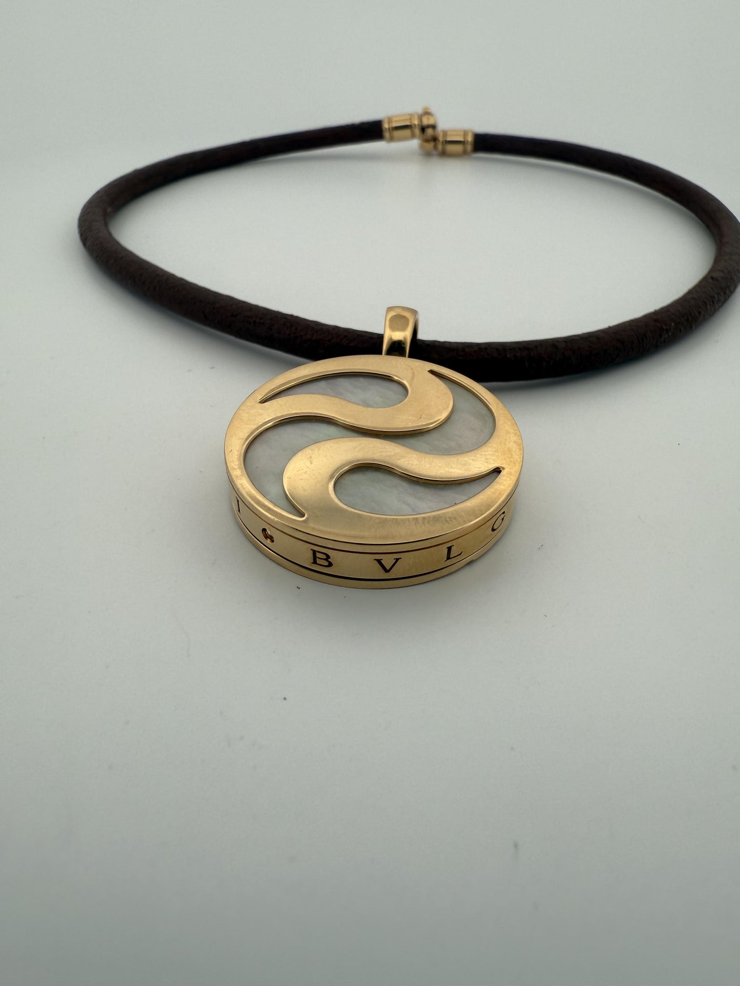 Bulgari Spinning MOP Optical Illusion Pendant w/18K and Leather Necklace