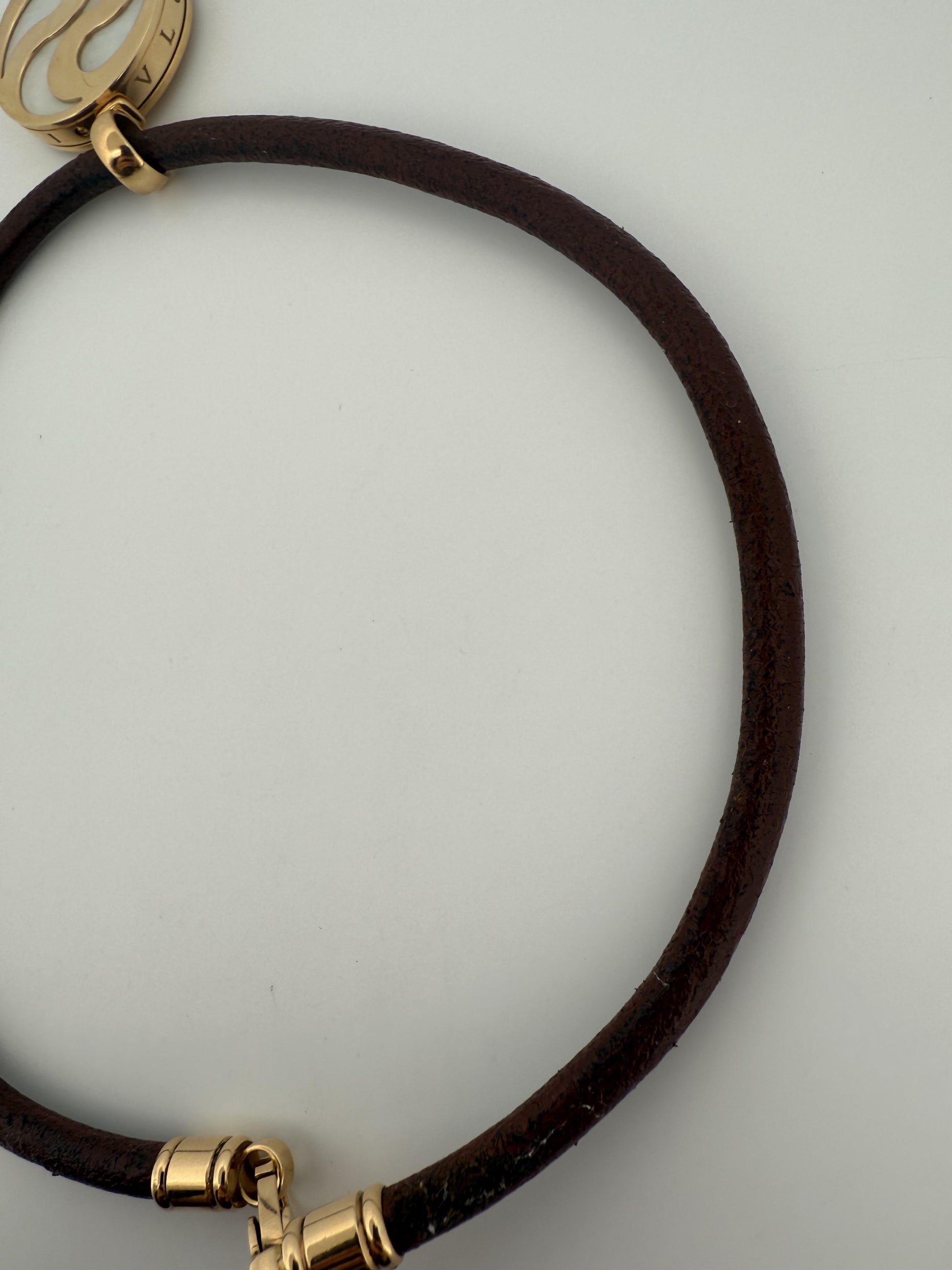 Bulgari Spinning MOP Optical Illusion Pendant w/18K and Leather Necklace