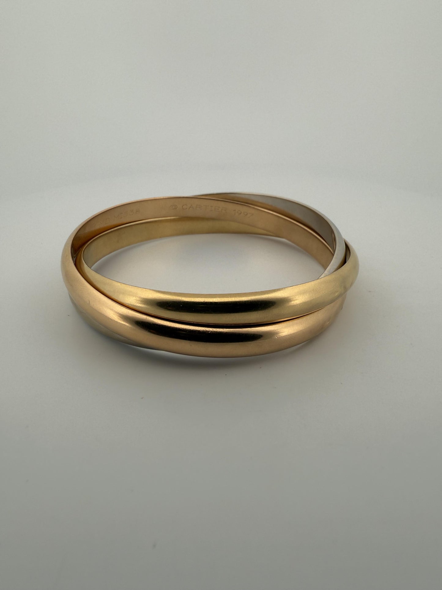 Cartier Trinity Tri-Colored Bangle in 18K Rose, White, Yellow Gold