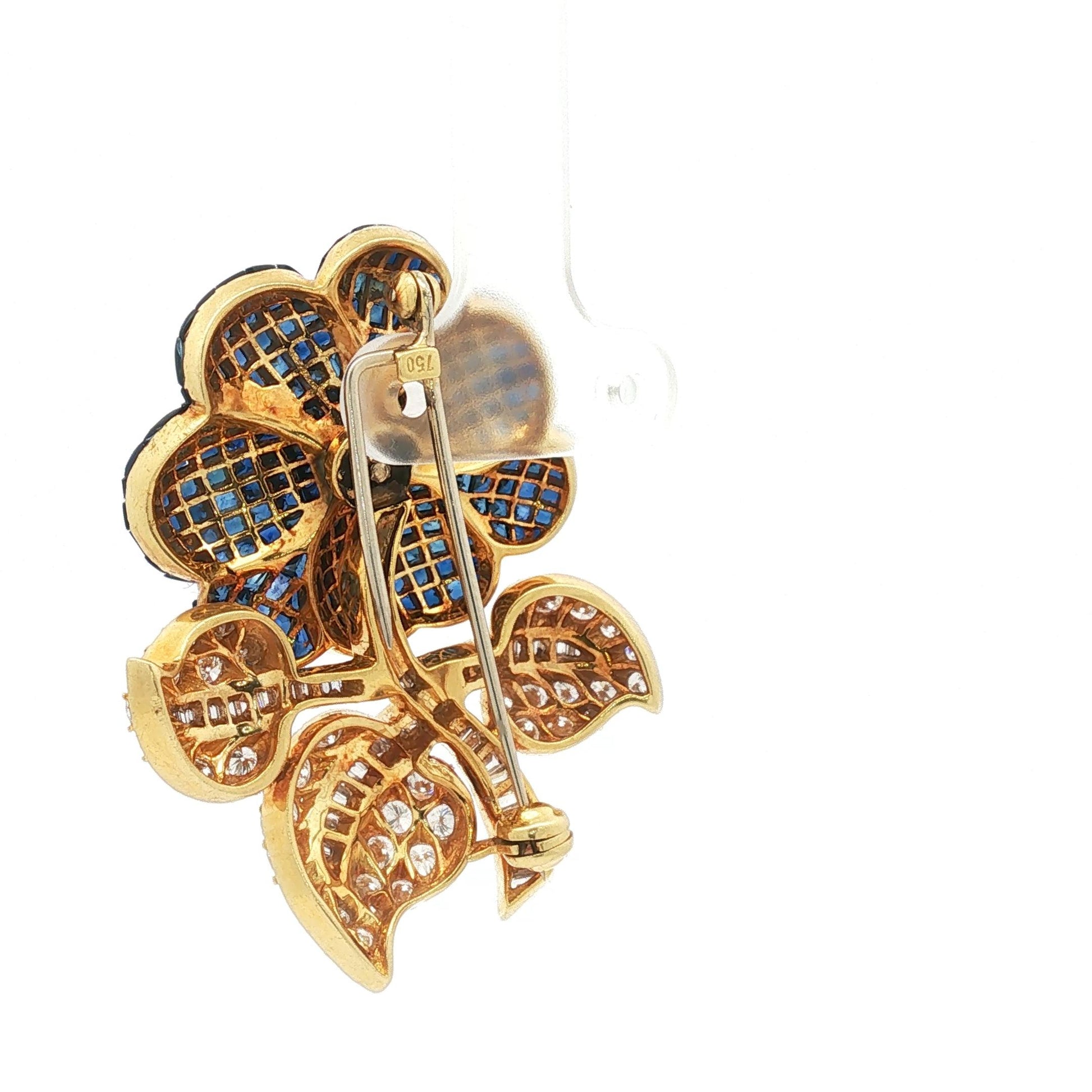 1960s 18K Mystery-Set Sapphire Flower Brooch With Diamond Leaf and Stem