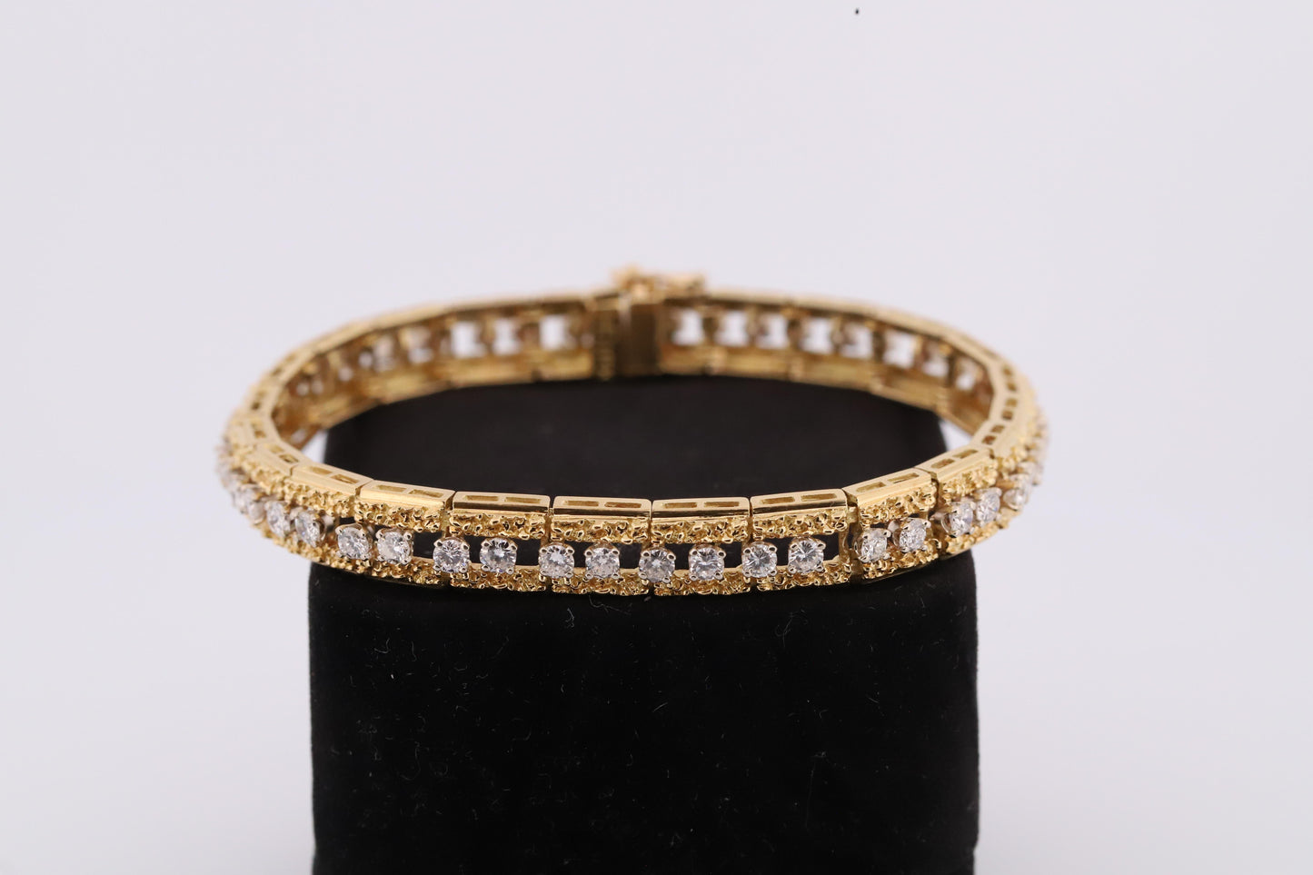 Intricately Designed 18K Vintage Diamond Tennis Bracelet by Hammerman Brothers