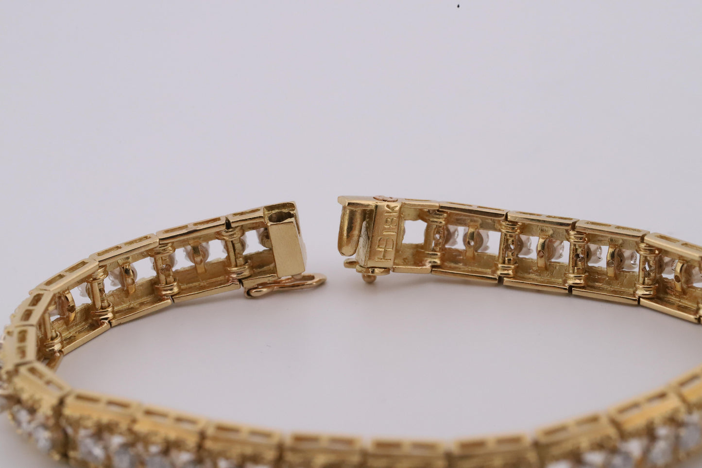 Intricately Designed 18K Vintage Diamond Tennis Bracelet by Hammerman Brothers