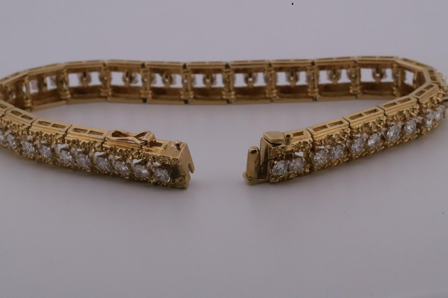 Intricately Designed 18K Vintage Diamond Tennis Bracelet by Hammerman Brothers