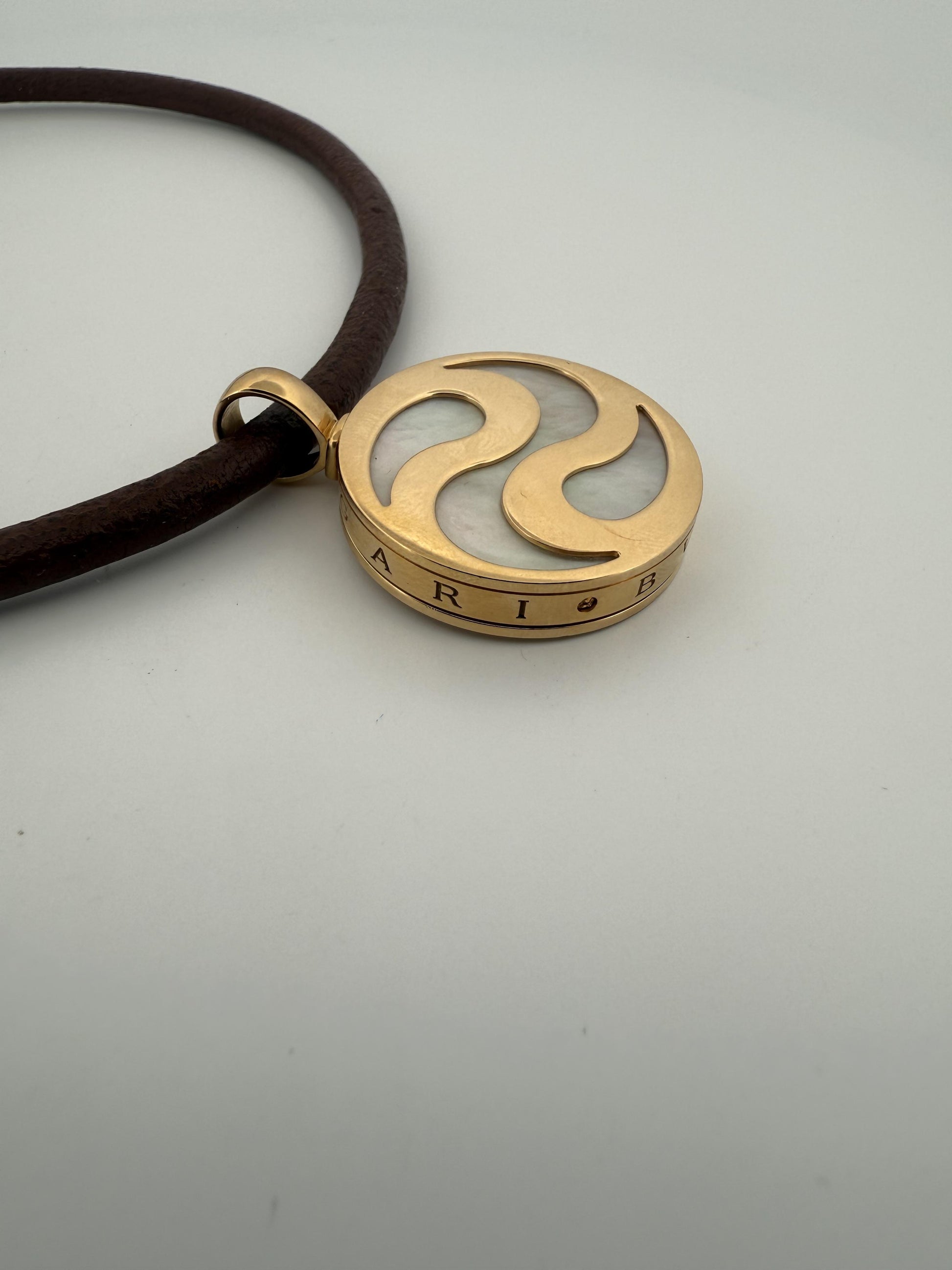 Bulgari Spinning MOP Optical Illusion Pendant w/18K and Leather Necklace