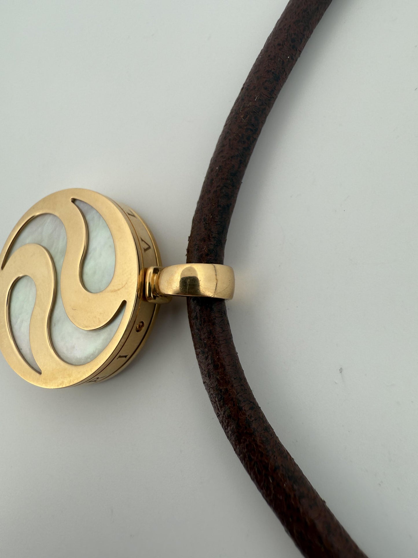 Bulgari Spinning MOP Optical Illusion Pendant w/18K and Leather Necklace