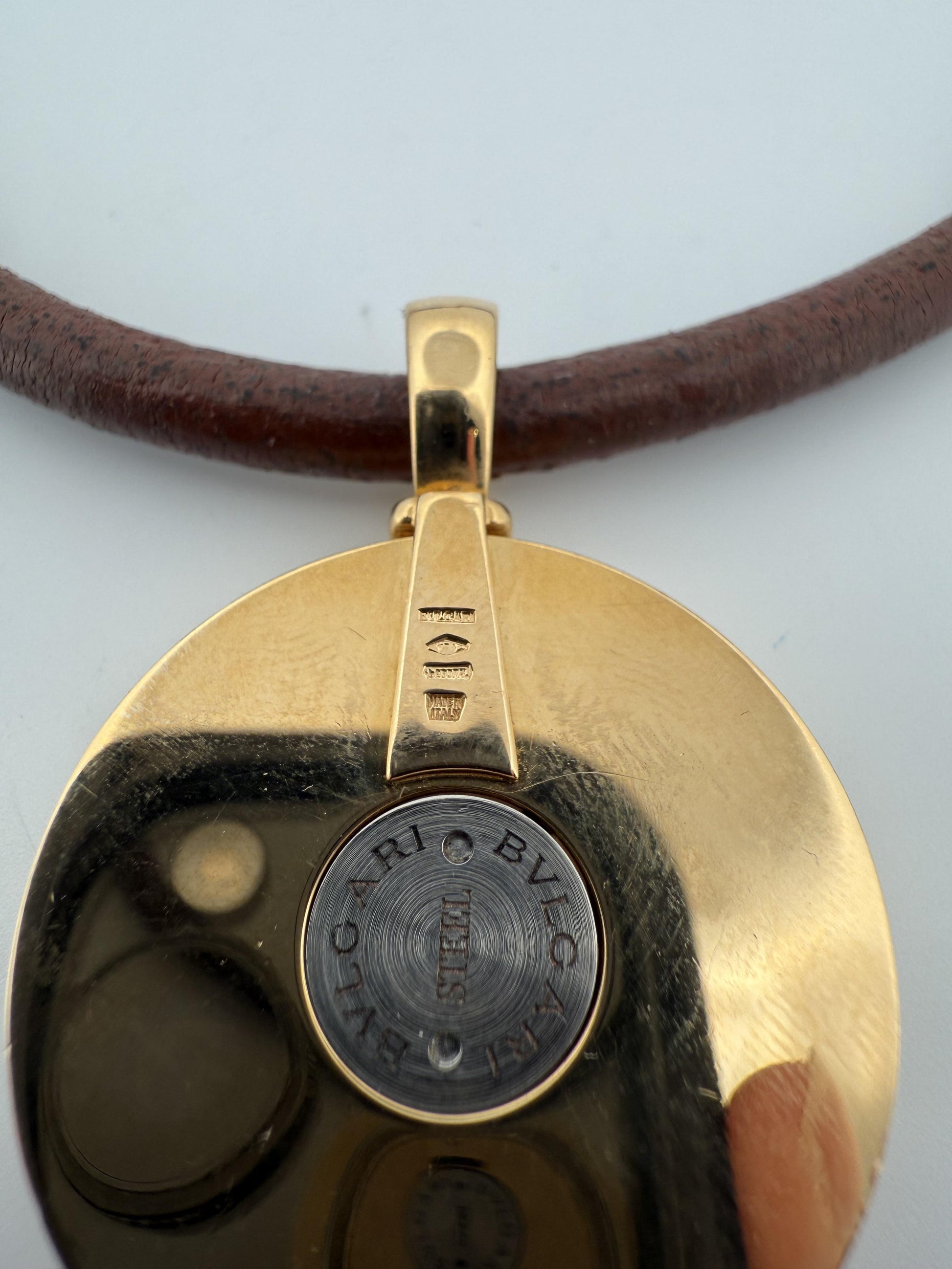 Bulgari Spinning MOP Optical Illusion Pendant w/18K and Leather Necklace