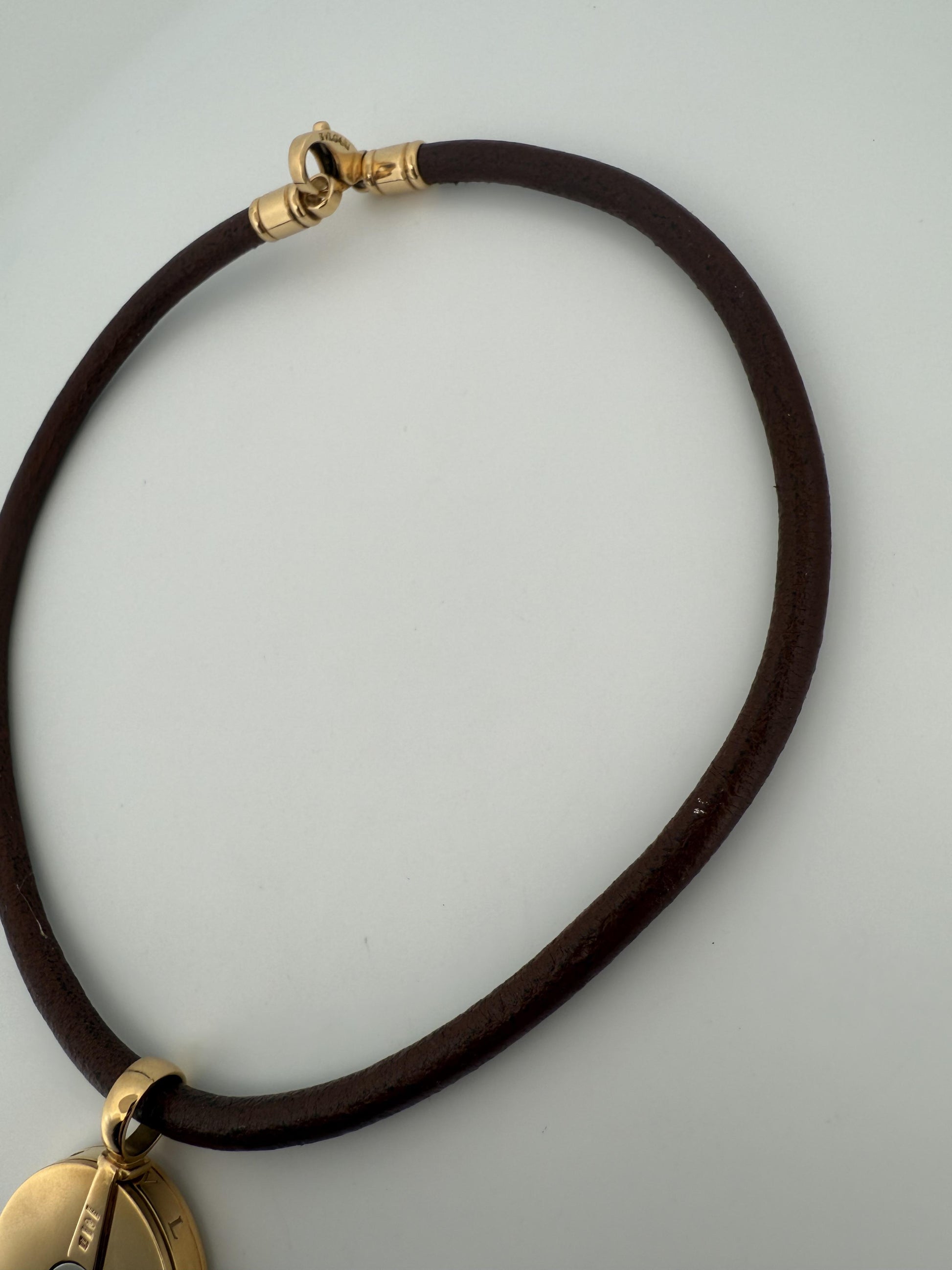 Bulgari Spinning MOP Optical Illusion Pendant w/18K and Leather Necklace