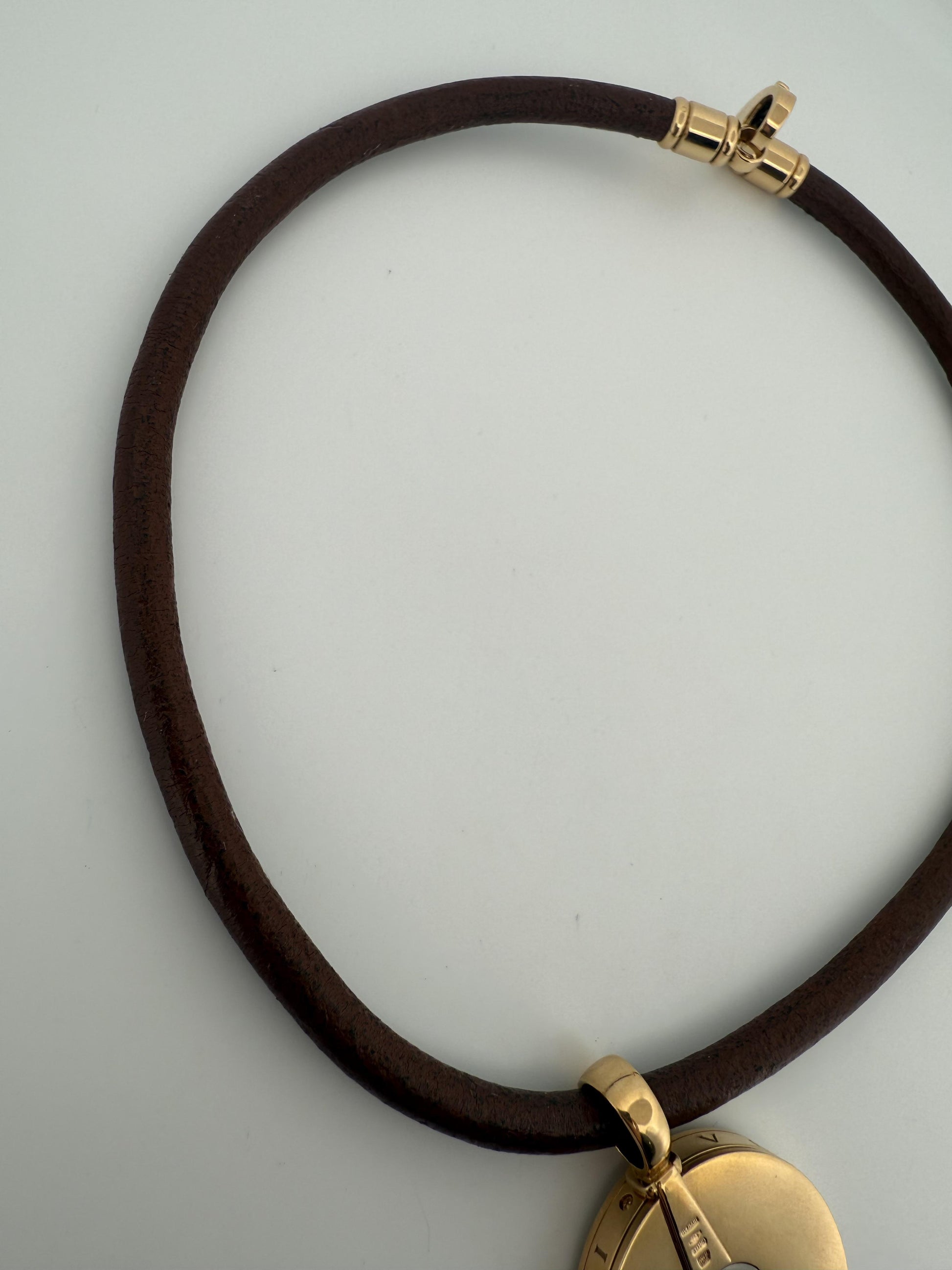 Bulgari Spinning MOP Optical Illusion Pendant w/18K and Leather Necklace