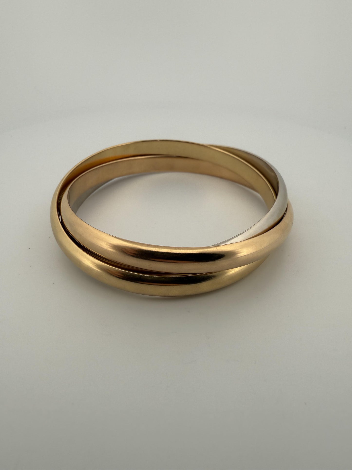 Cartier Trinity Tri-Colored Bangle in 18K Rose, White, Yellow Gold