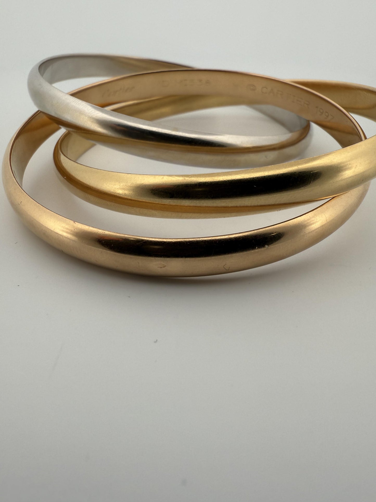 Cartier Trinity Tri-Colored Bangle in 18K Rose, White, Yellow Gold