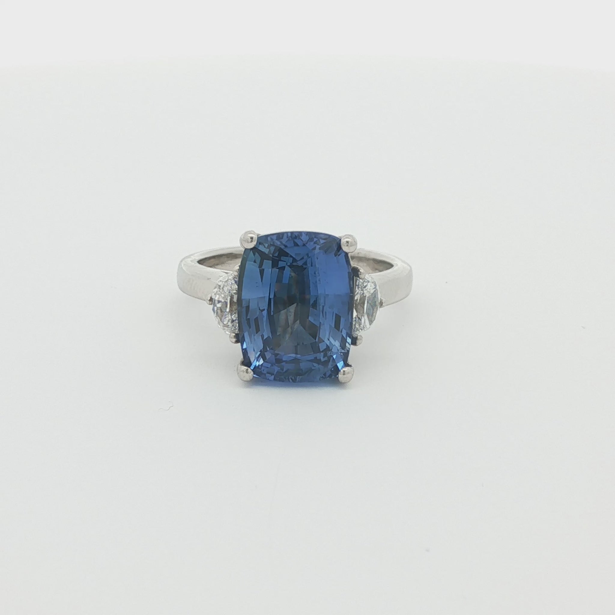 Cushion-Cut Sapphire and Half-Moon Diamond Three-Stone Ring, Platinum